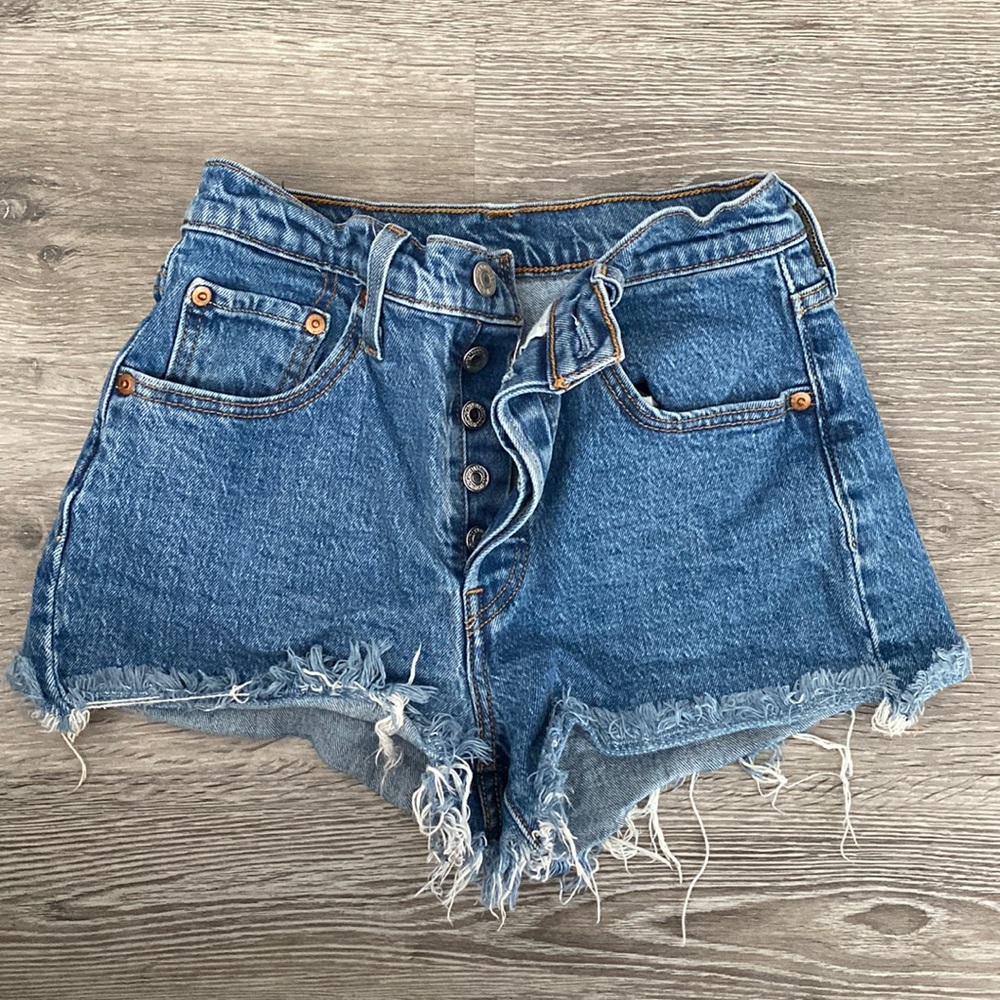 Worn once. Brand new Levi denim mini shorts! Size 25